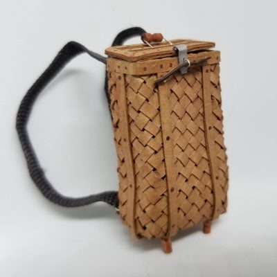 Miniature birch bark backpack with a working lid. 
Made with card stock, wire, wood, ribbon.