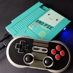 Classic looking mini gaming console, in the style of BMO from the animated show Adventure Time.