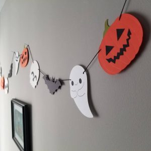 Halloween garland illustrated in Illustrator and cut out on cricut.