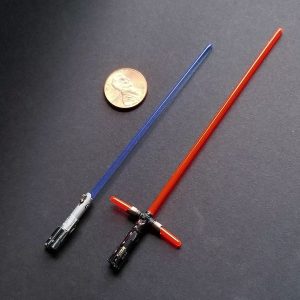 Anakin's/Luke's/Rey's and Kylo Ren's lightsabers from Star Wars, but tiny. 